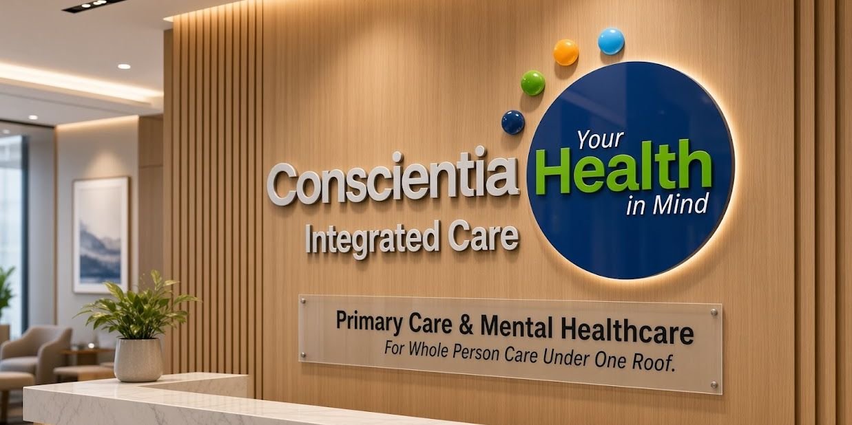 Conscientia Health Integrated Care reception sign: Primary Care & Mental Healthcare, whole-person care under one roof